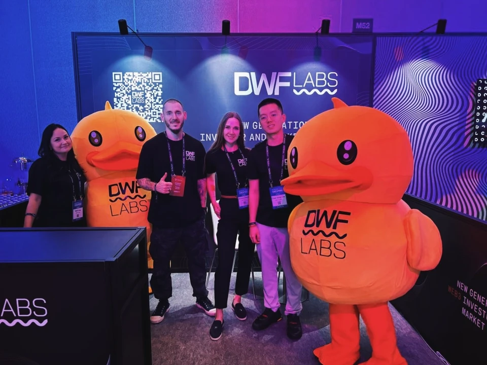 DWF Labs team at the branded booth at TOKEN2049 Singapore, 2024